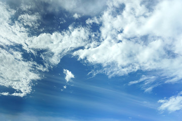 Naklejka na ściany i meble Nature background.Soft cloud in the blue sky on a sunny day.