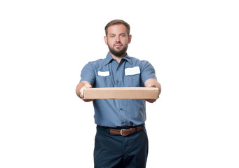 Portrait of happy delivery man with cardboard box