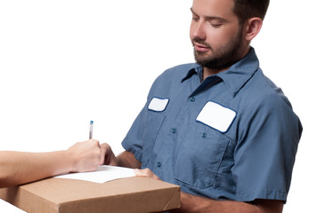 Delivery man handing parcel box to recipient - courier service concept