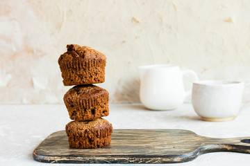 Chocolate muffins on a light background