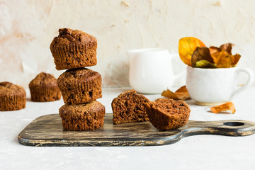 Chocolate muffins on a light background