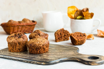 Chocolate muffins on a light background