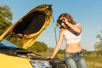 Girl repairing car