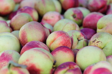 fresh peaches selling in the market