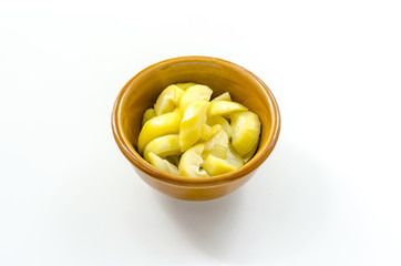 mango compote in brown bowl on white background