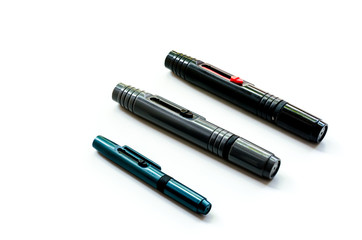 Lenspen for photographer: useful equipment on the white background