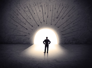 man standing in front of the huge gate