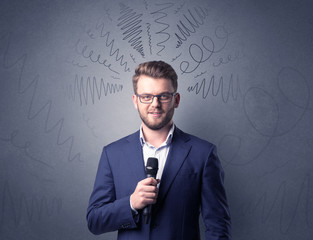 Businessman holding microphone