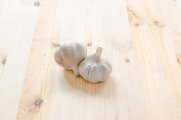 Garlic on wooden table background