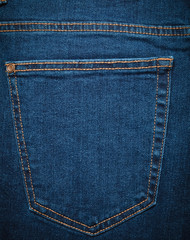 The texture of the jeans pocket is close-up.