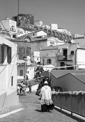 Pisticci (Matera, Italy) - A white town on the badlands hills, in province of Matera, Basilicata region, southern Italy, during the Saint Rocco patron feast