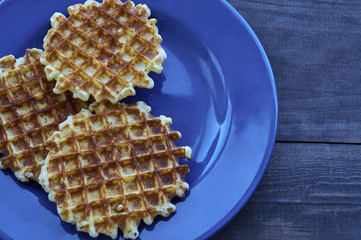 Waffles on a blue plate