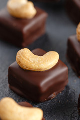 Handmade chocolate bonbons with cashew