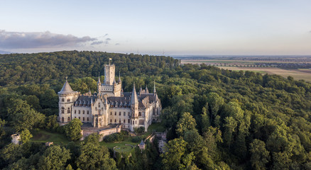Fototapeta na wymiar Aerial view of a Gothic revival Marienburg castle in Lower Saxony, Germany