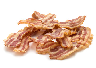 cooked crispy slices of bacon isolated on white background