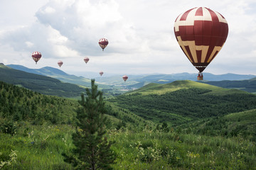 Naklejka premium Tourism hot air balloon