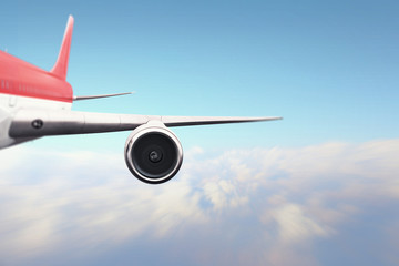 Fototapeta premium Close of airplane in sky. Mixed media