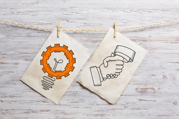 Paper pinned to rope. Mixed media