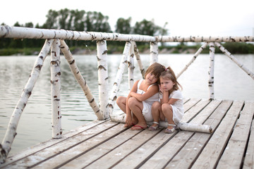 Girls on  bridge of birch   concept of tenderness