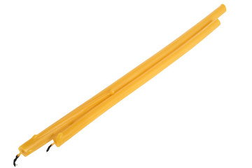 Two yellow church wax candles isolated on white background