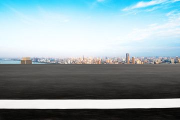 Panoramic skyline and buildings with empty road