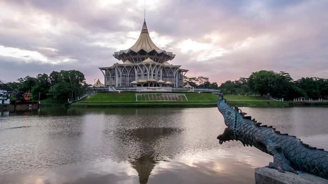 SARAWAK - JUNE 27: A 4K footage of beautiful zooming out sunrise with the background view of Sarawak State Legislative Assembly and Waterfront on June 27, 2017 in Sarawak.
