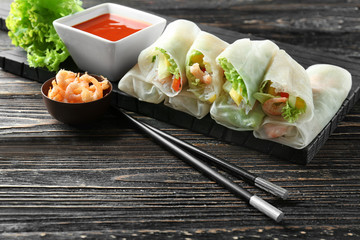 Portion of spring rolls on table