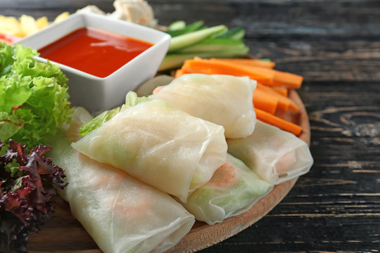 Portion of spring rolls on table