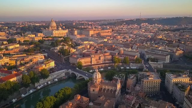 rome aerial view at sunrise flying over vatican city
