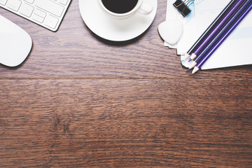 Empty wooden desktop with supplies