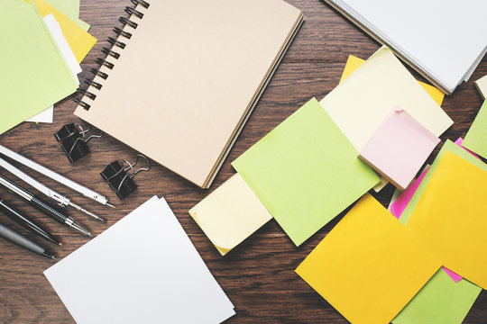 Clear spiral notepad on wooden desktop