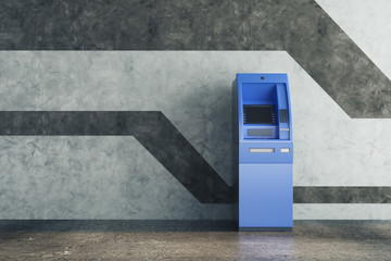 Blue ATM in concrete interior