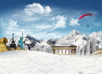 World landmarks among the mountains with snow and man flying in the sky