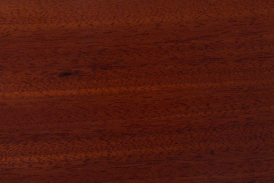 Red wood pattern of the surface.