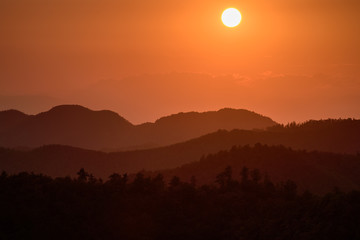 Sunset over distant hills in Tuscany, just outside San Godenzo, Florence region