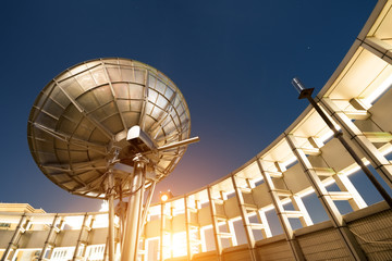 Satellite dish sky sun stars communication technology network image background for design sunset