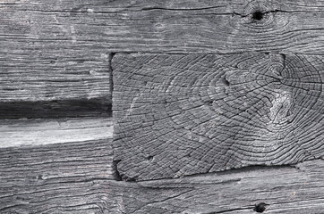 wooden board, is  smashed into another wooden board with two holes