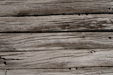 wooden boards with cracks, are located one by one