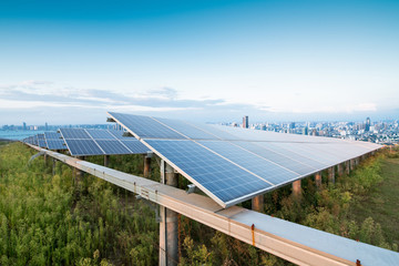 solar panels with the sunny sky. Blue solar panels. background of photovoltaic modules for...
