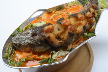 Sour soup made of tamarind paste with walking catfish