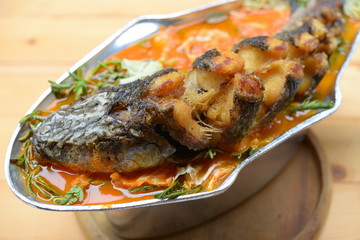 Sour soup made of tamarind paste with walking catfish