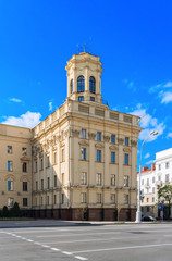 Obraz premium Central building kgb in Minsk, Belarus. Classical facade with columns. Blue sky with clouds. City landscape.