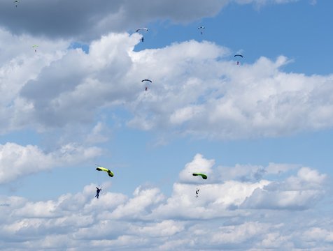 Russia, Kolomna, Aerograd, Many Landing skydiver.