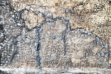 Stone wall near position little brown color