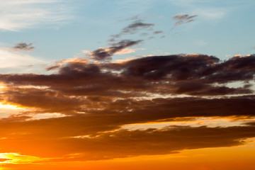 colorful dramatic sky with cloud at sunset.