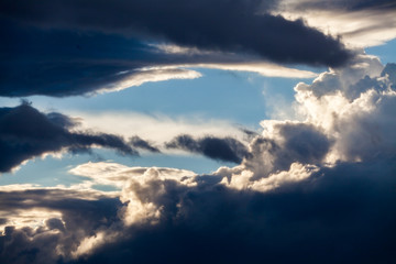 colorful dramatic sky with cloud at sunset.