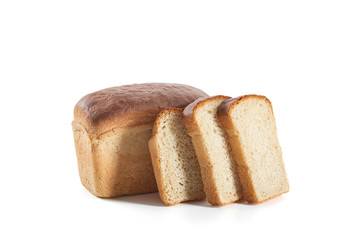 Close up shot of sliced delicious freshly baked bread isolated on white.