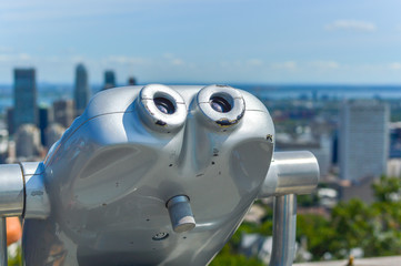 Hi-Spy viewing machines overlooking Montreal skyline.