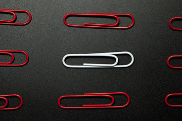 row of paper clip, different concept