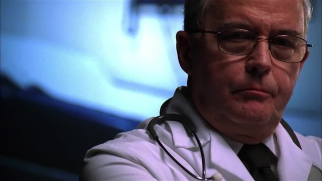 Closeup of older male doctor.